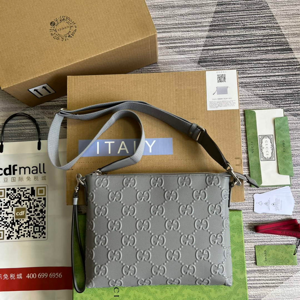 Gucci 696009 GG embossed medium messenger bag gray