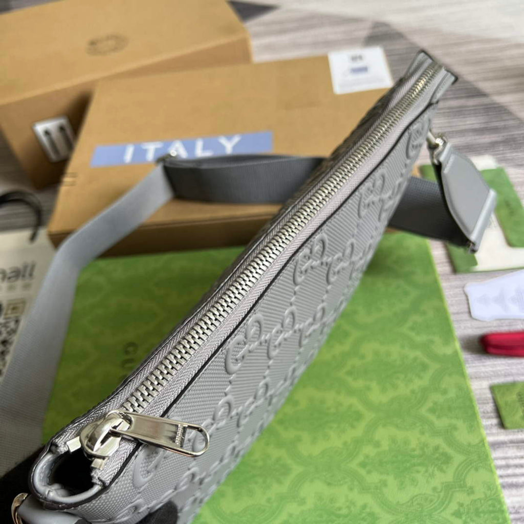 Gucci 696009 GG embossed medium messenger bag gray