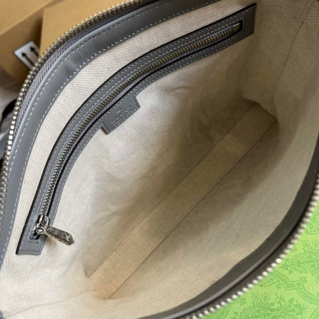Gucci 696009 GG embossed medium messenger bag gray