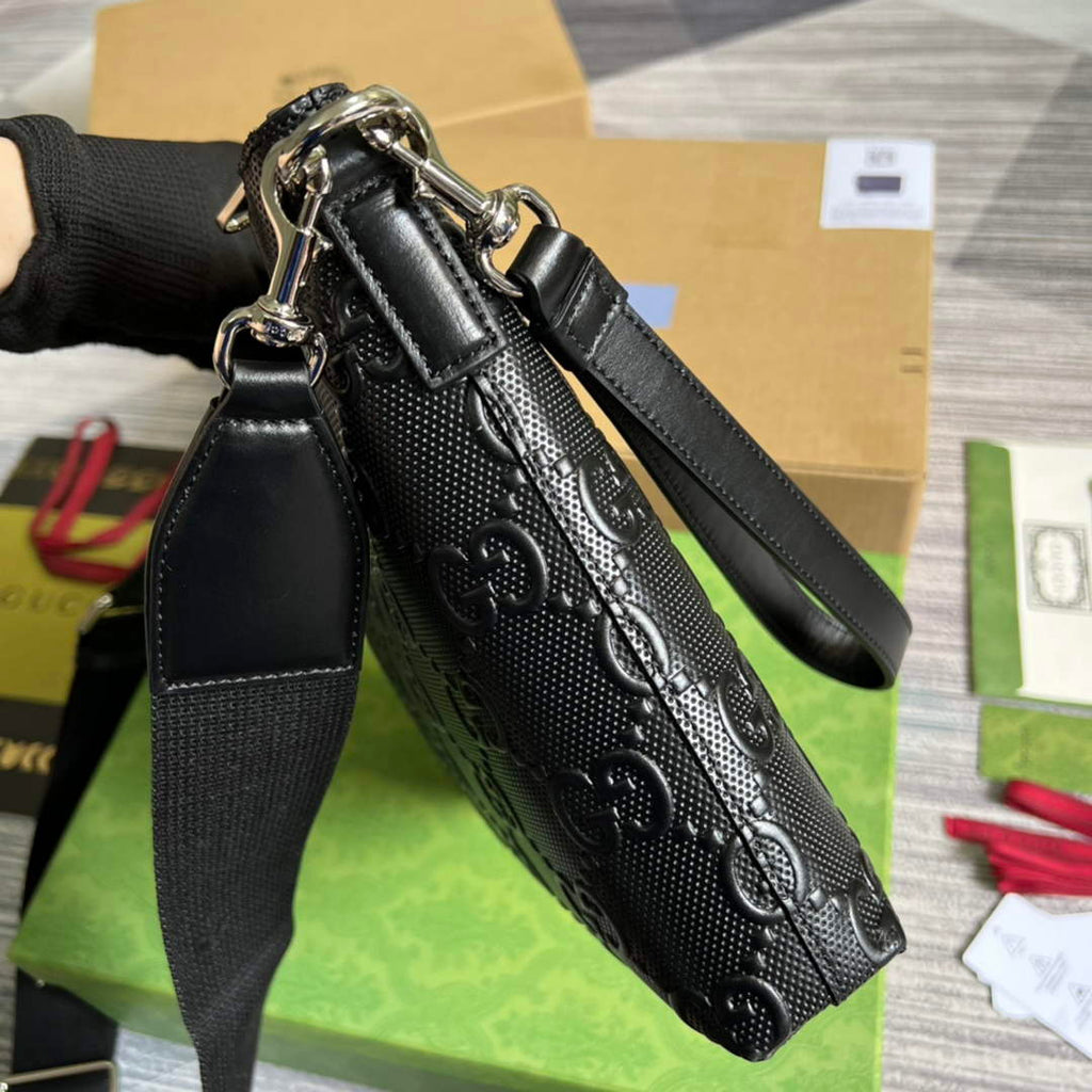 Gucci 696009 GG embossed medium messenger bag black