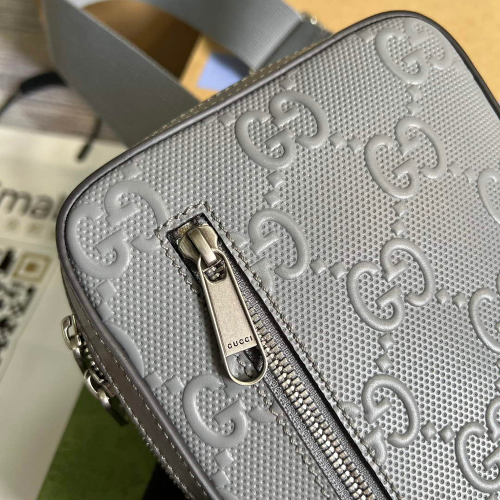 Gucci ‎700431 GG embossed sling backpack Grey