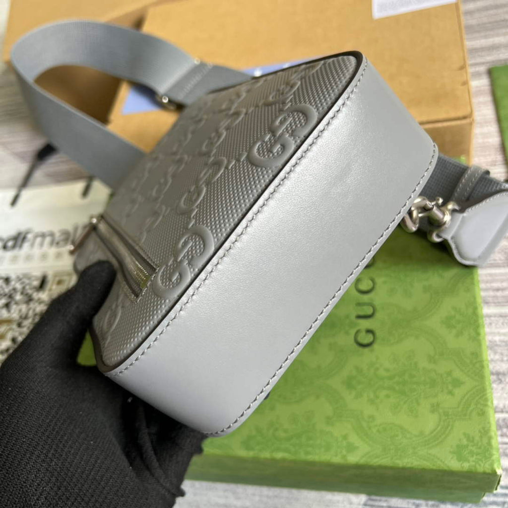 Gucci ‎700431 GG embossed sling backpack Grey