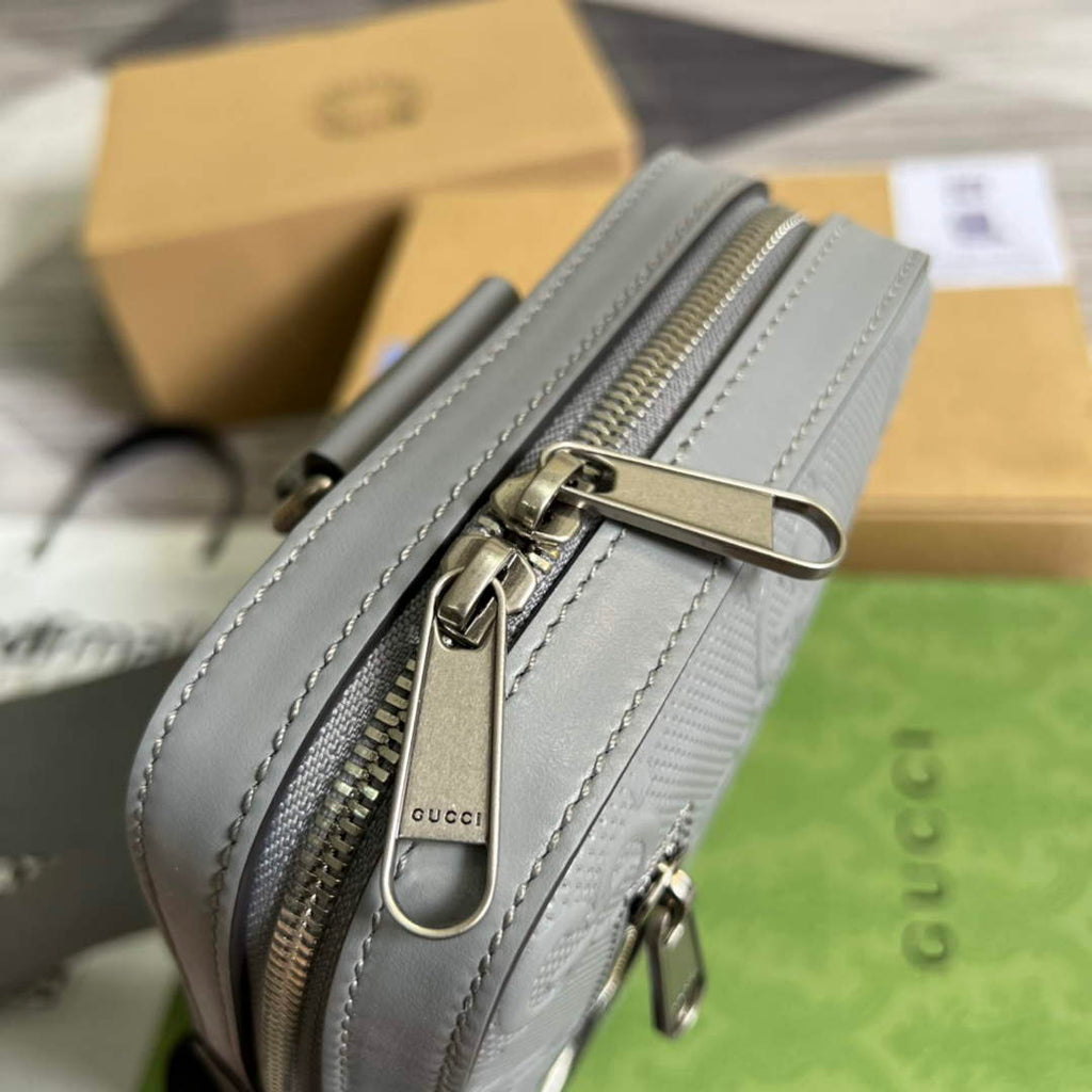 Gucci ‎700431 GG embossed sling backpack Grey