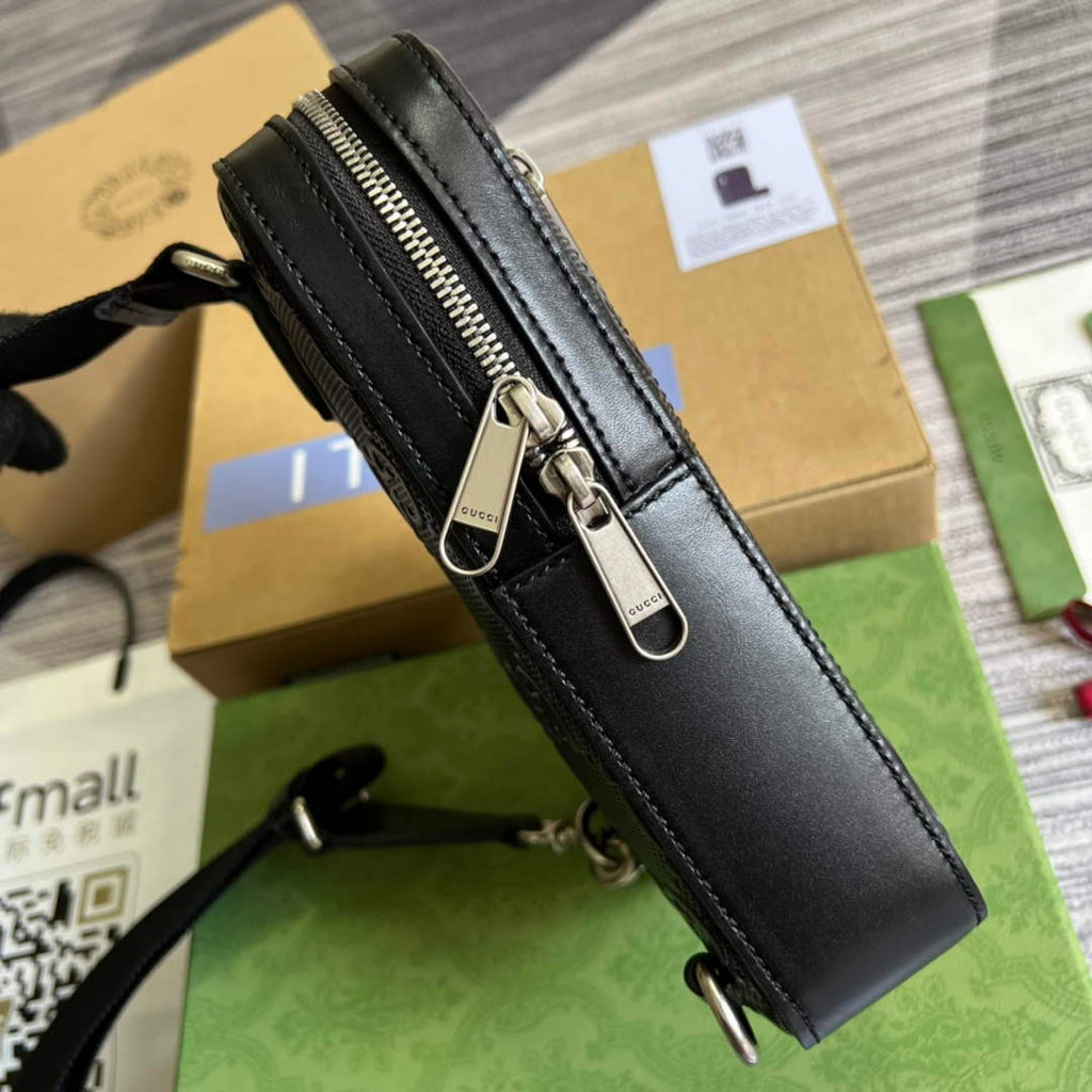 Gucci ‎700431 GG embossed sling backpack black