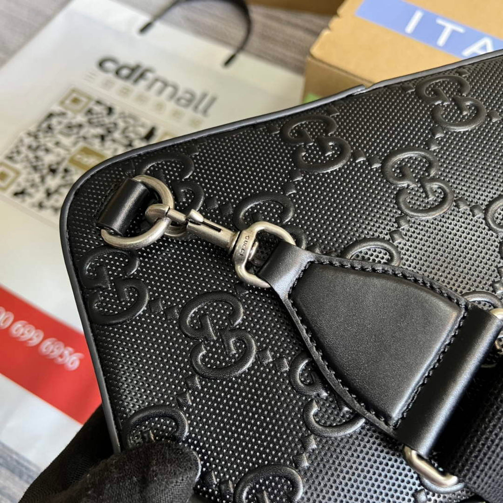 Gucci ‎700431 GG embossed sling backpack black