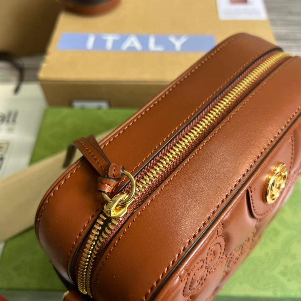 Gucci 702234 GG Matelassé leather shoulder bag Brown