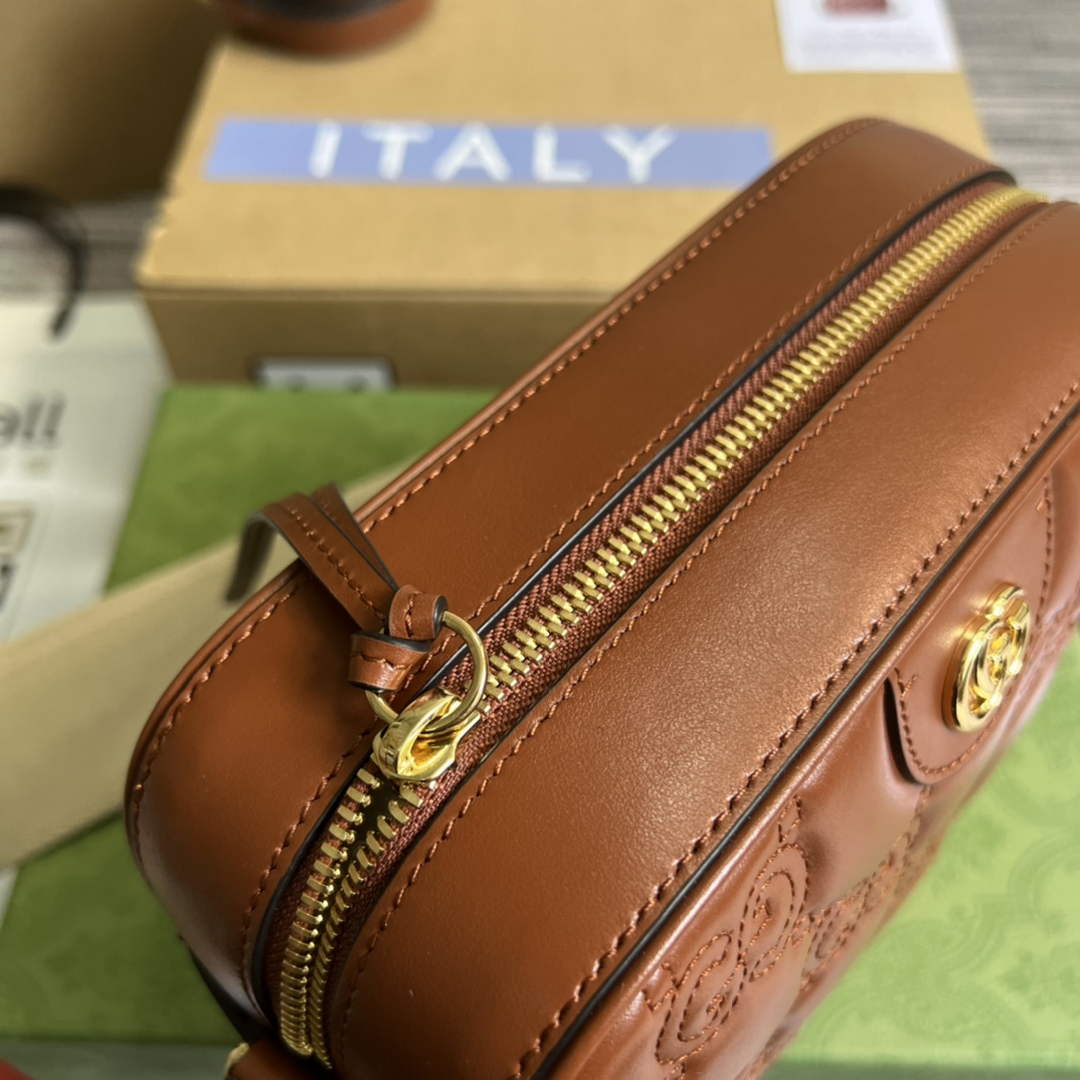 Gucci 702234 GG Matelassé leather shoulder bag Brown