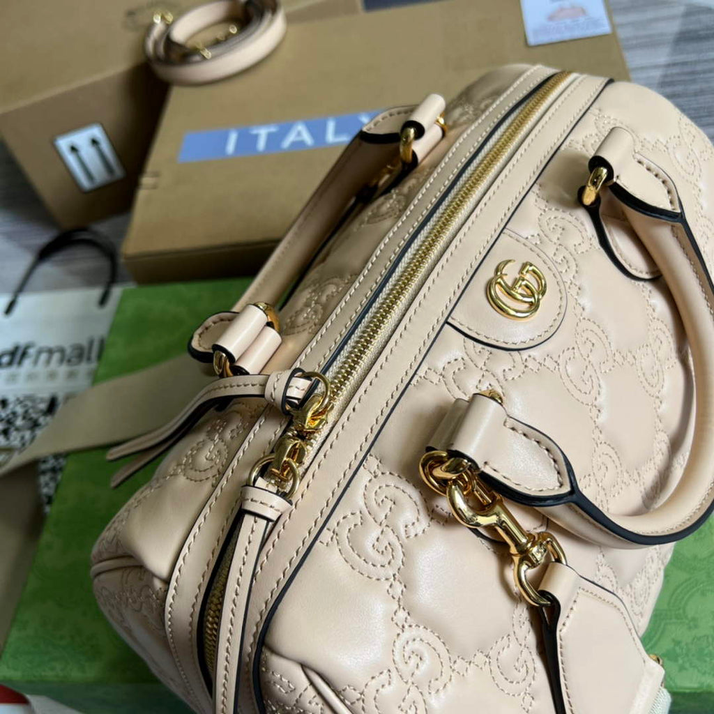 Gucci ‎‎702242 GG Matelassé leather medium bag beige
