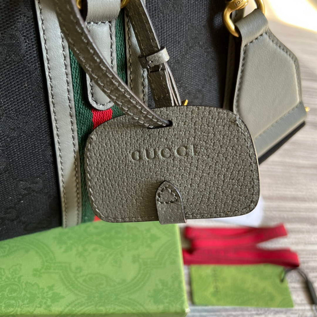 Gucci 715772 Small canvas top handle bag Gray leather