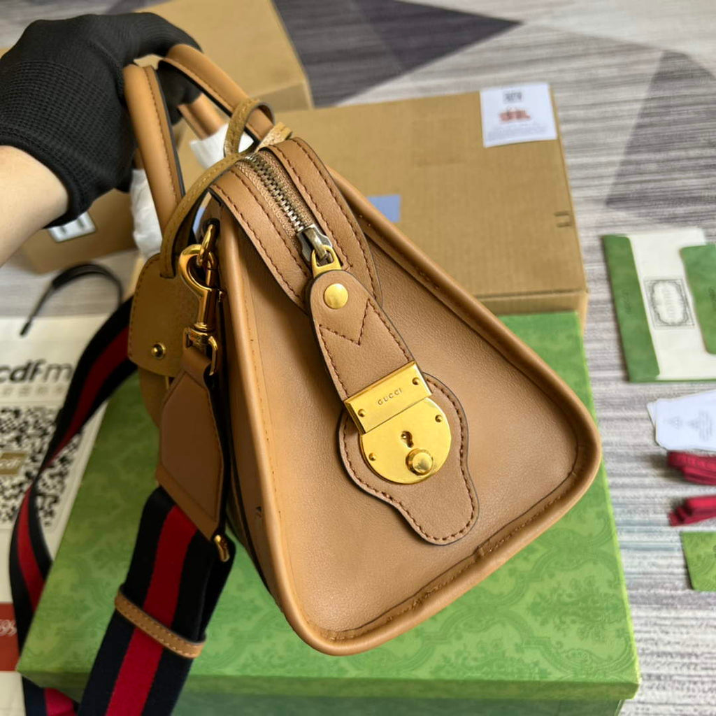 Gucci 715772 Small top handle bag with Double G Brown leather