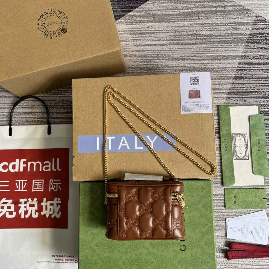 Gucci ‎723770 GG Matelassé top handle mini bag Brown leather
