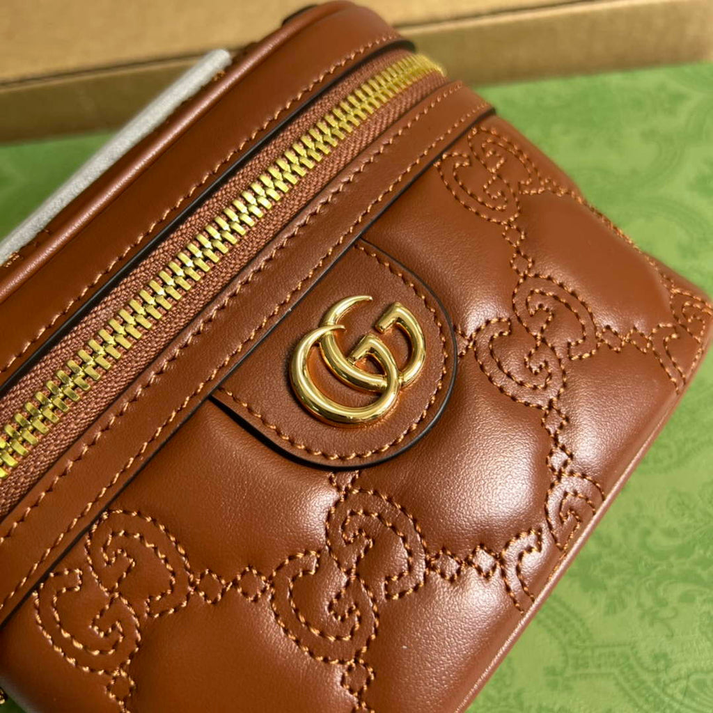Gucci ‎723770 GG Matelassé top handle mini bag Brown leather