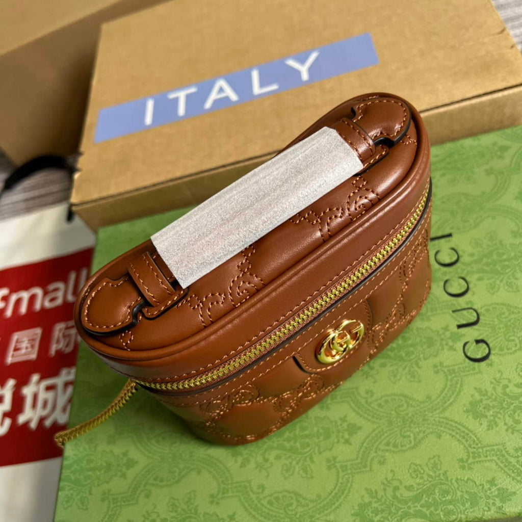 Gucci ‎723770 GG Matelassé top handle mini bag Brown leather