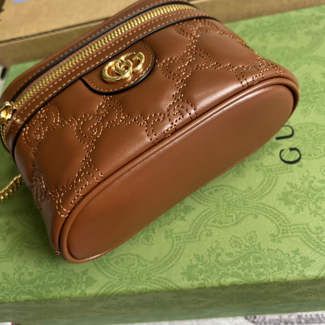 Gucci ‎723770 GG Matelassé top handle mini bag Brown leather