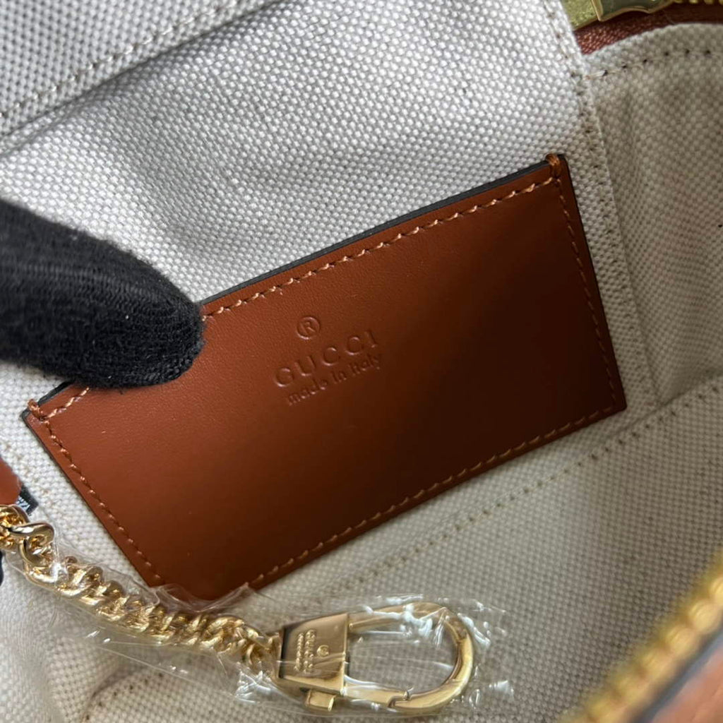 Gucci ‎723770 GG Matelassé top handle mini bag Brown leather