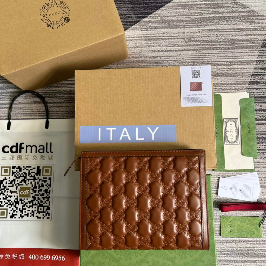 Gucci 723780 GG Matelassé pouch Brown