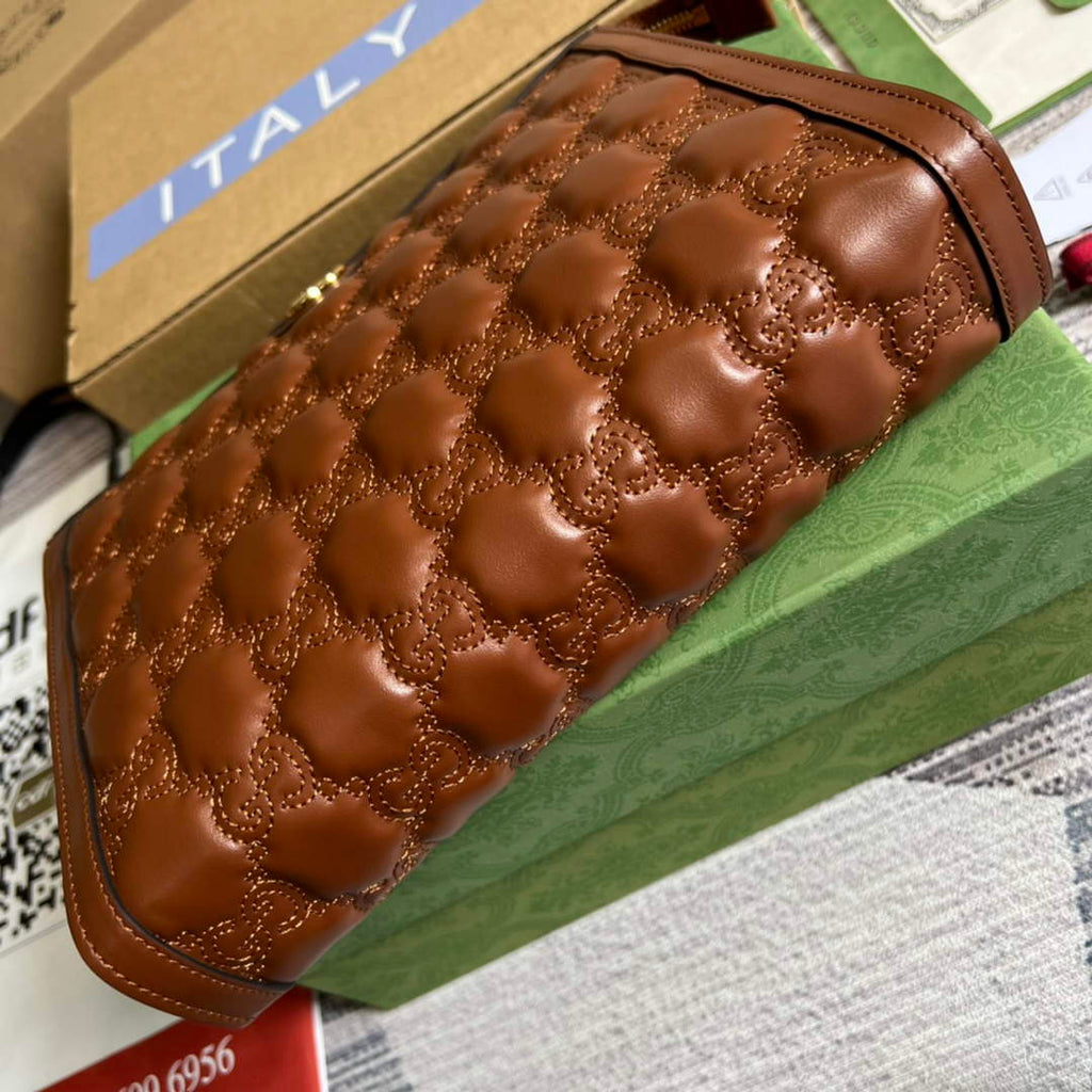 Gucci 723780 GG Matelassé pouch Brown