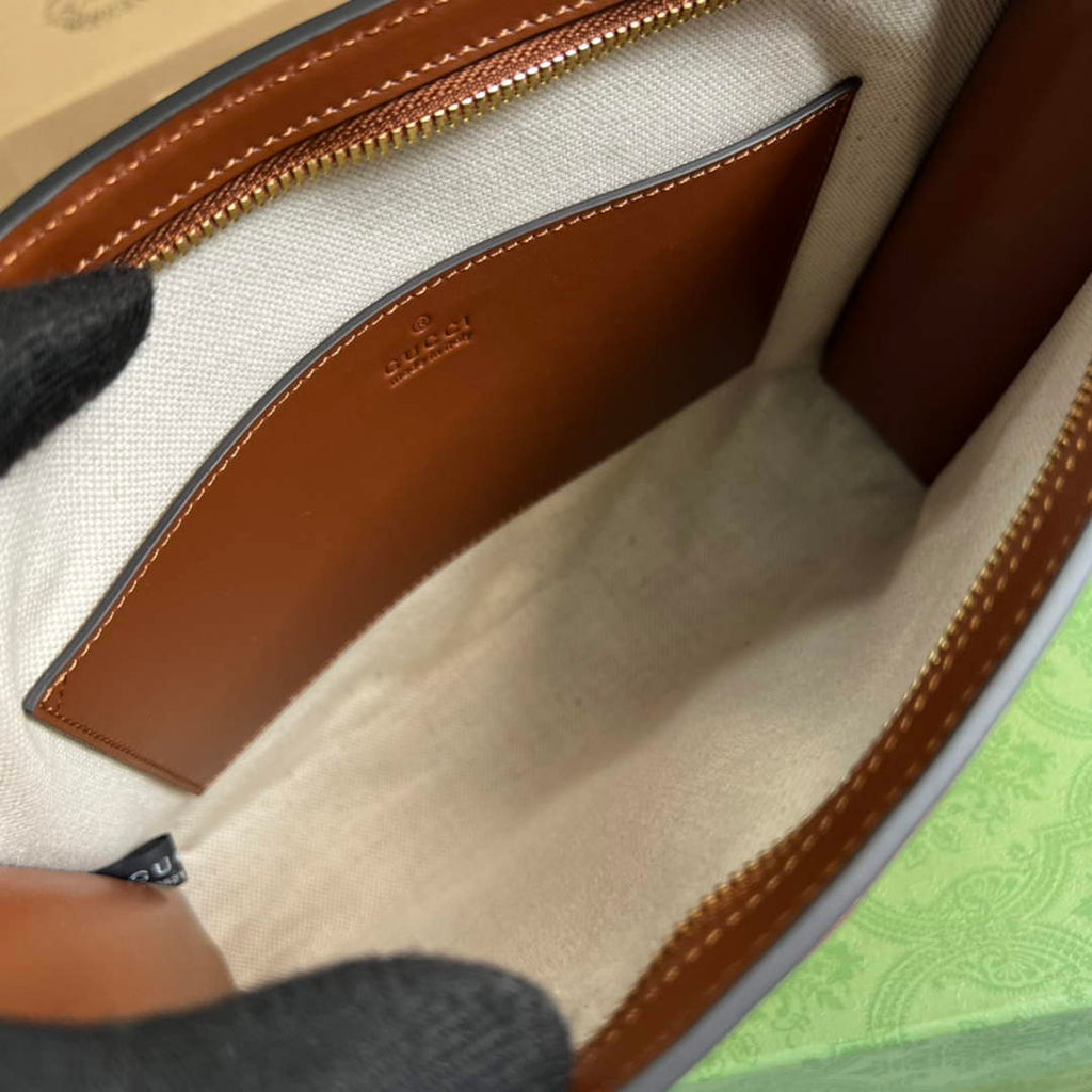 Gucci 723780 GG Matelassé pouch Brown
