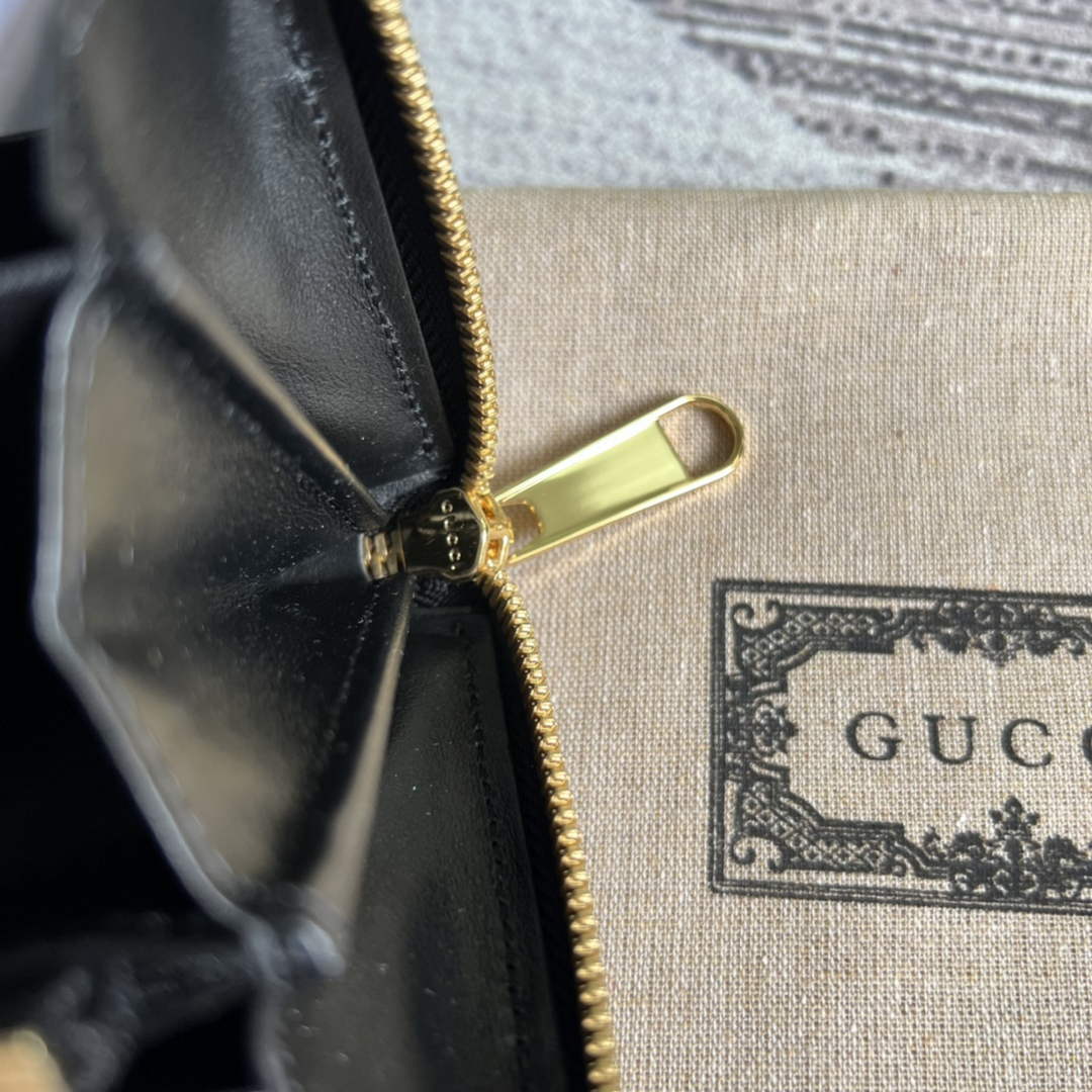 Gucci 723784 GG Matelassé zip-around wallet black leather