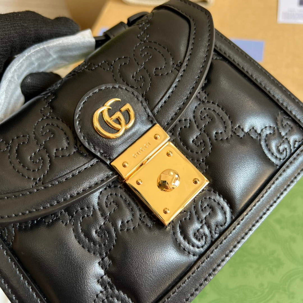 Gucci 724499 GG matelassé small top handle bag black leather