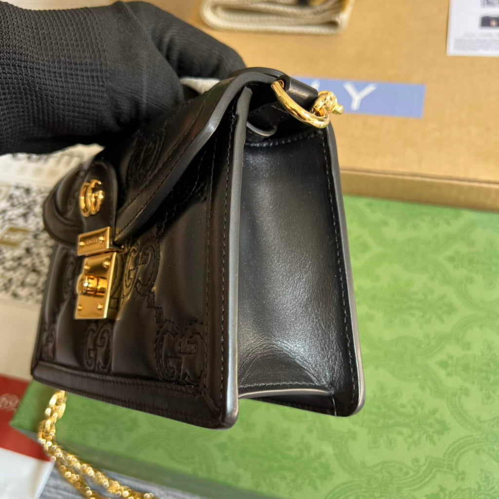 Gucci 724499 GG matelassé small top handle bag black leather