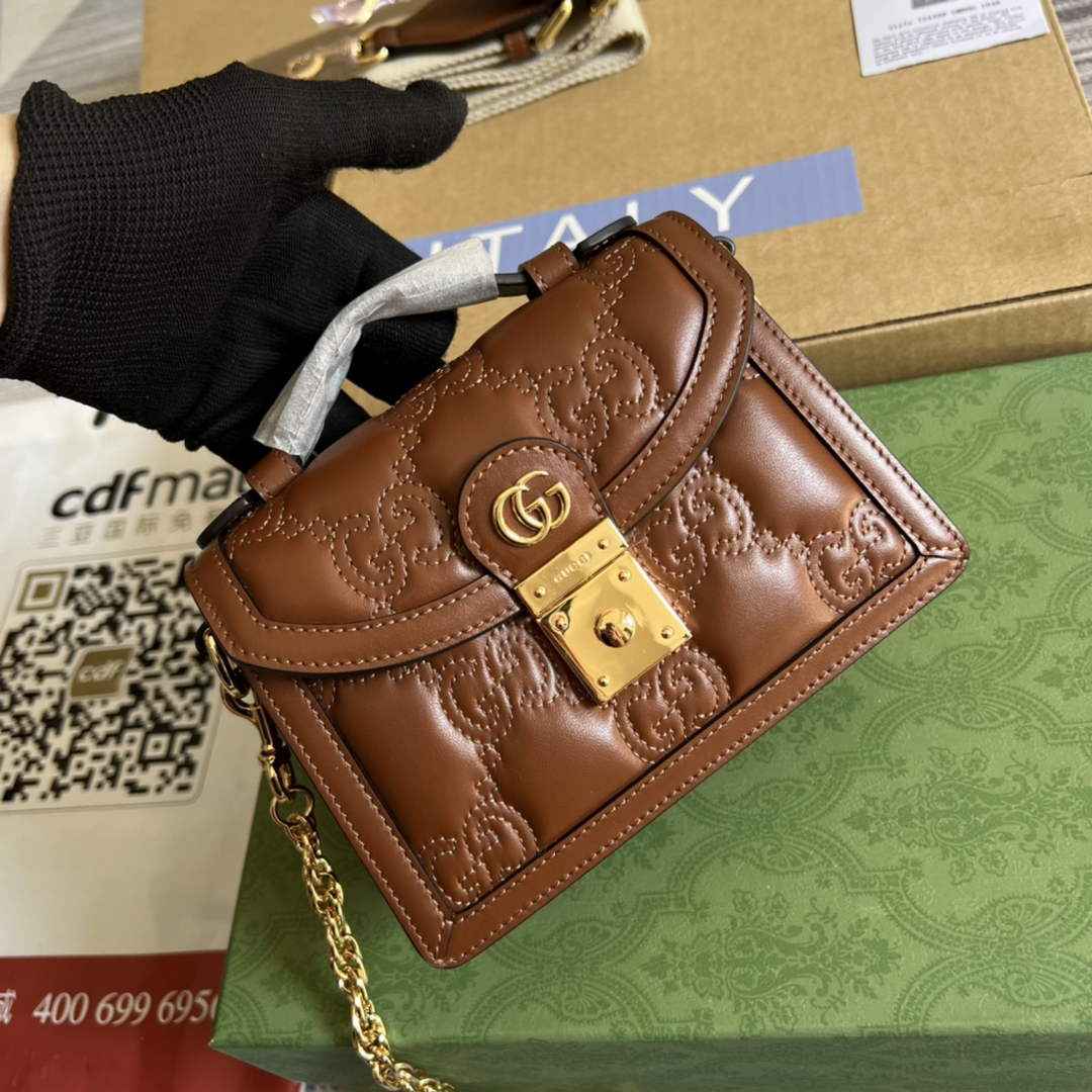 Gucci 724499 GG matelassé small top handle bag Brown leather