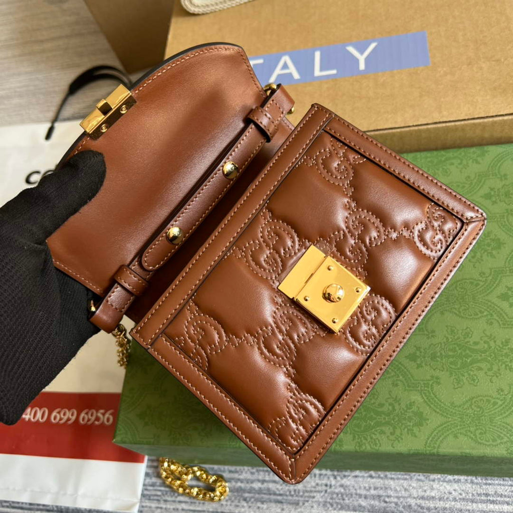 Gucci 724499 GG matelassé small top handle bag Brown leather