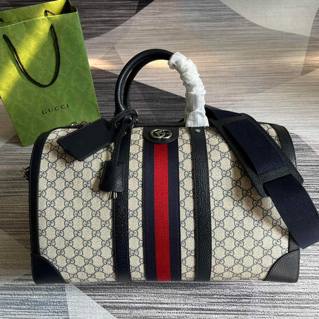 Gucci 724642 Savoy small duffle bag Beige and blue GG Supreme canvas