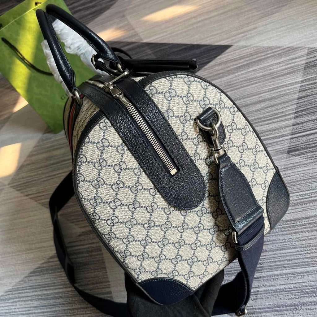 Gucci 724642 Savoy small duffle bag Beige and blue GG Supreme canvas