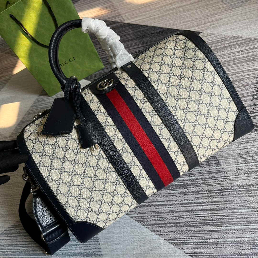 Gucci 724642 Savoy small duffle bag Beige and blue GG Supreme canvas