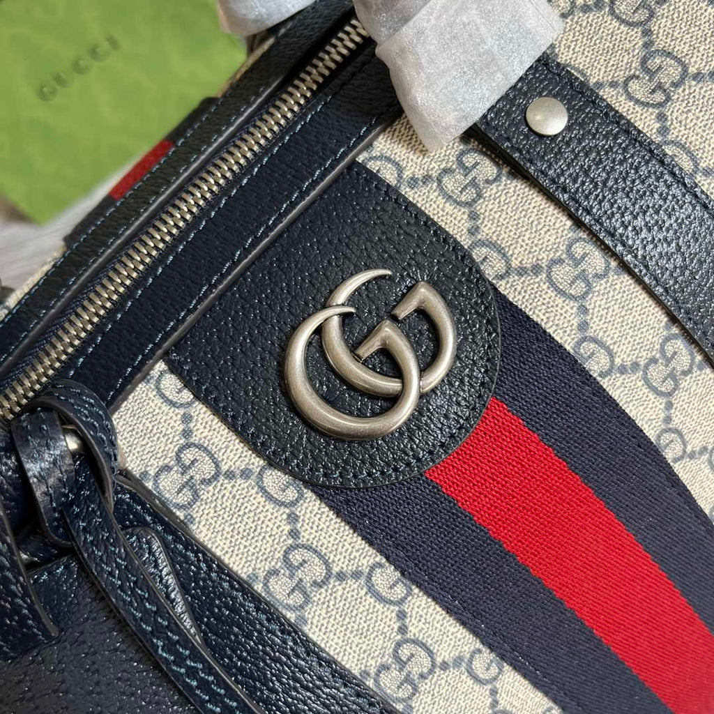 Gucci 724642 Savoy small duffle bag Beige and blue GG Supreme canvas