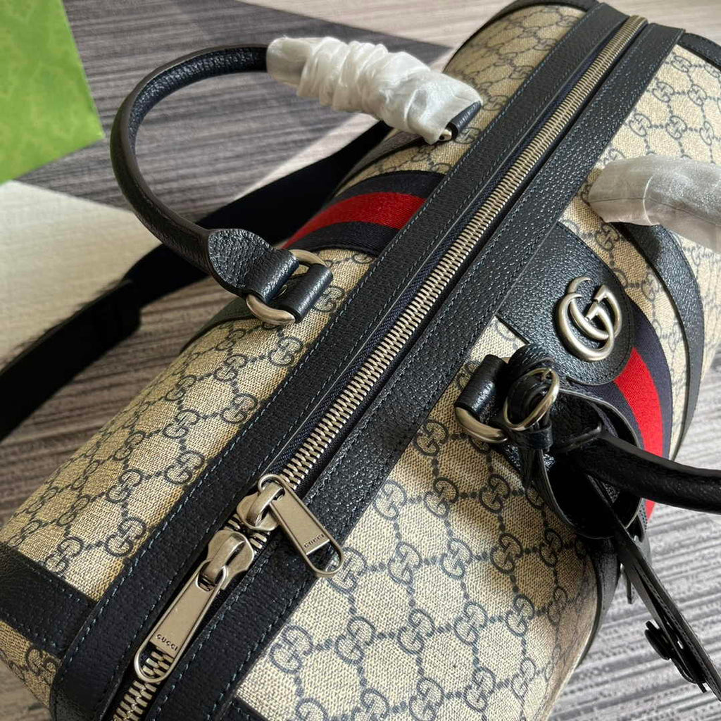 Gucci 724642 Savoy small duffle bag Beige and blue GG Supreme canvas