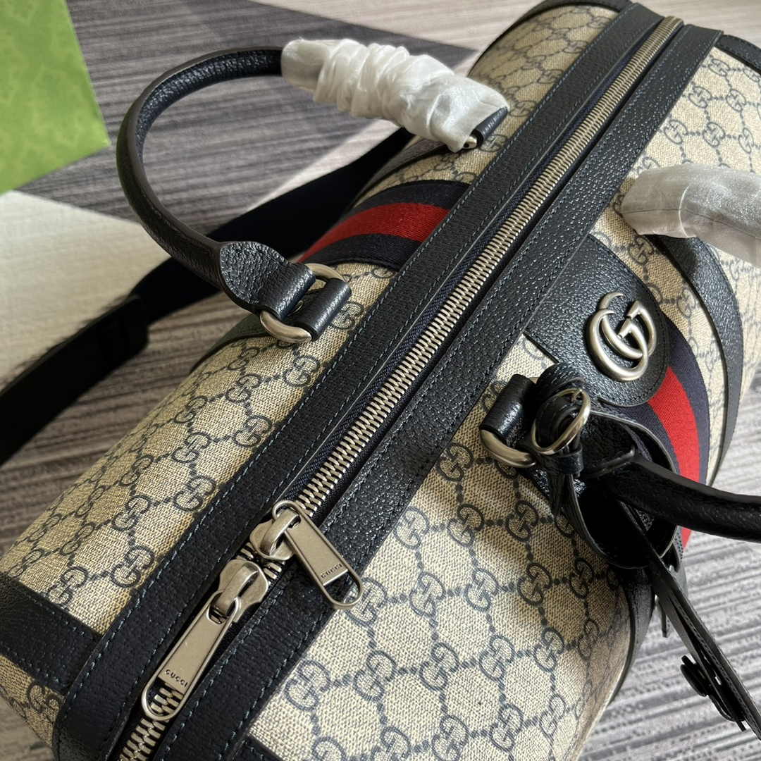 Gucci 724642 Savoy small duffle bag Beige and blue GG Supreme canvas
