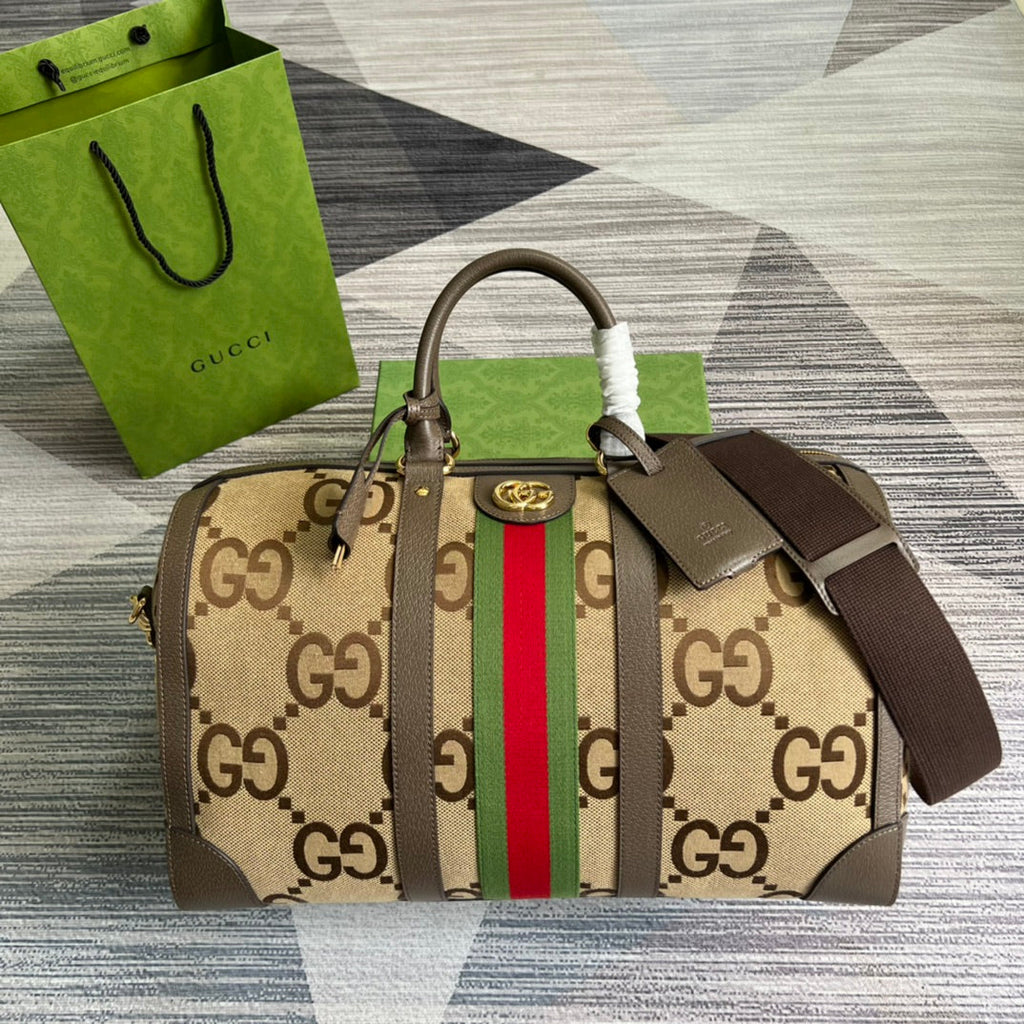 Gucci 724642 Jumbo GG small duffle bag in camel and ebony GG canvas