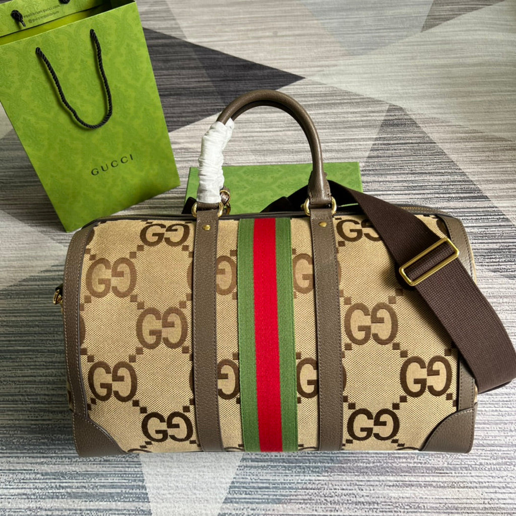 Gucci 724642 Jumbo GG small duffle bag in camel and ebony GG canvas