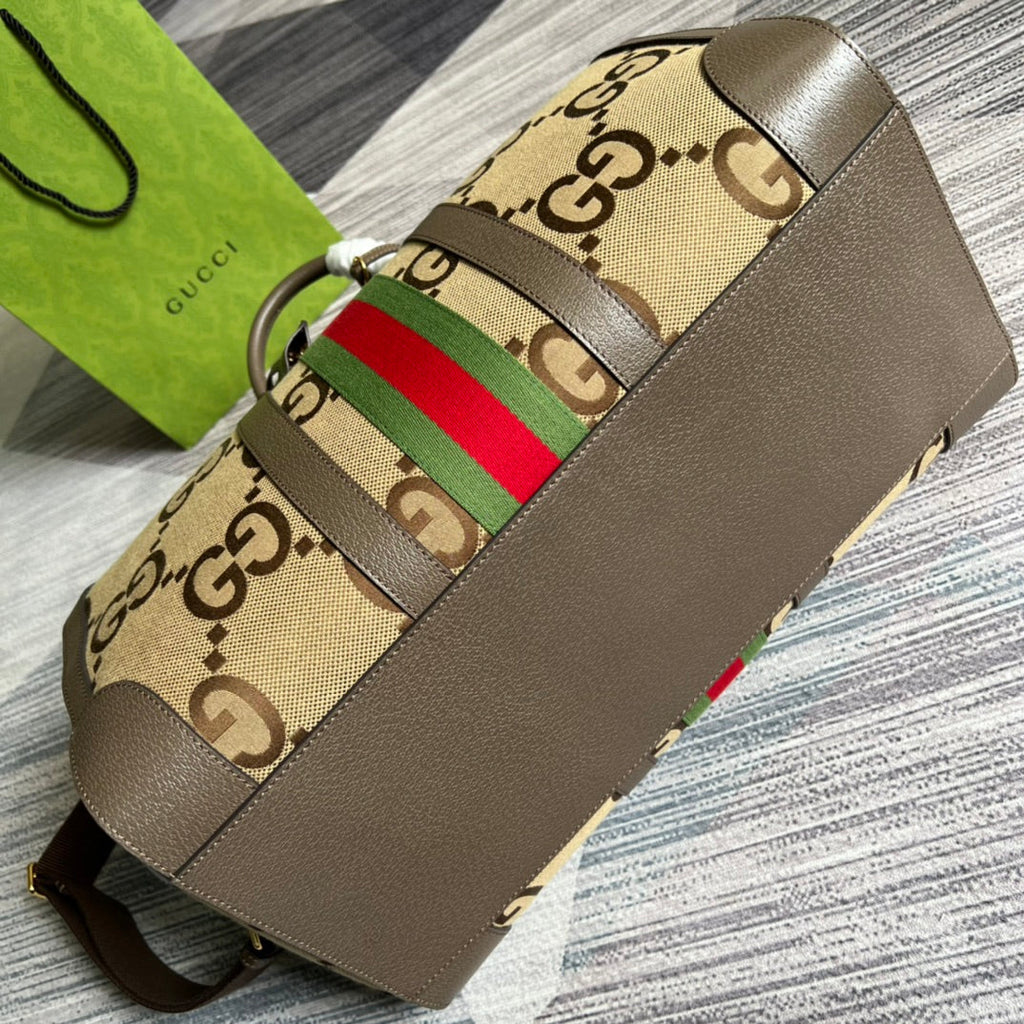 Gucci 724642 Jumbo GG small duffle bag in camel and ebony GG canvas