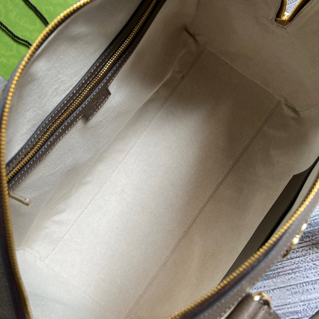 Gucci 724642 Jumbo GG small duffle bag in camel and ebony GG canvas