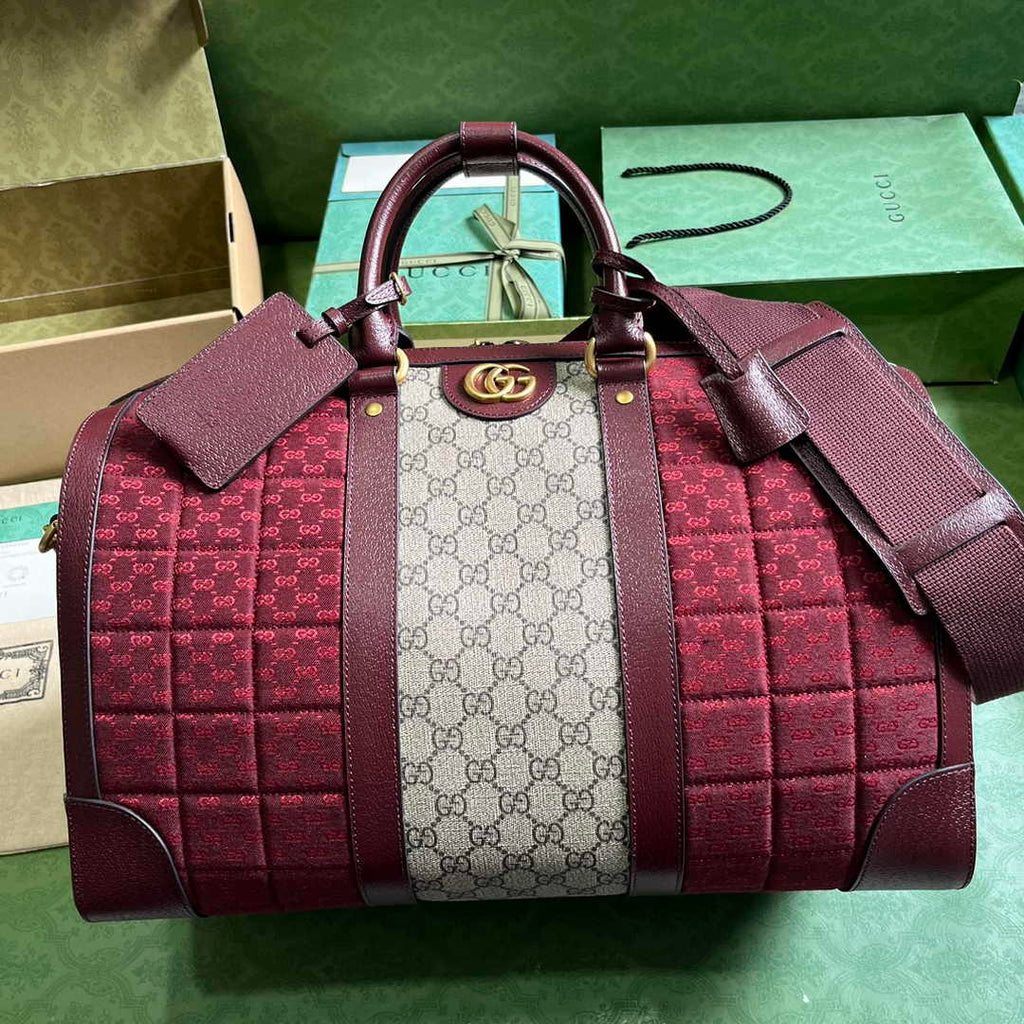 Gucci 724642 Mini GG canvas small duffle bag in Burgundy leather