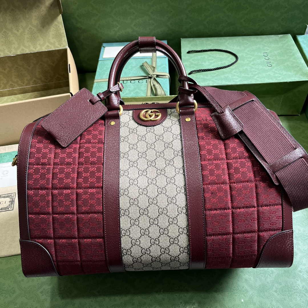 Gucci 724642 Mini GG canvas small duffle bag in Burgundy leather