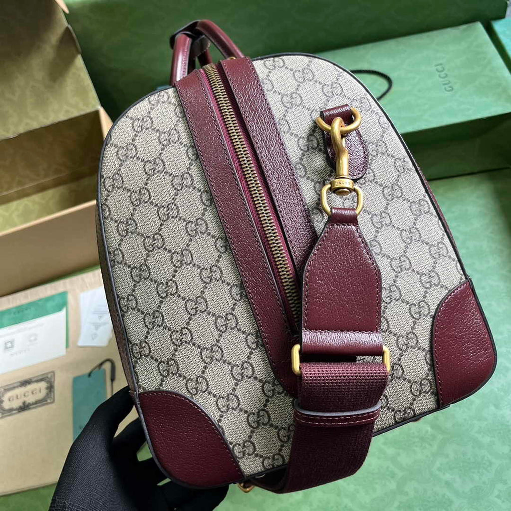 Gucci 724642 Mini GG canvas small duffle bag in Burgundy leather
