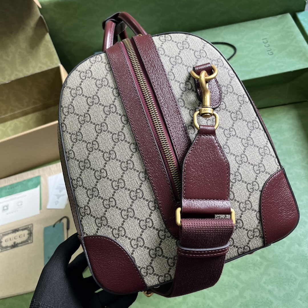 Gucci 724642 Mini GG canvas small duffle bag in Burgundy leather