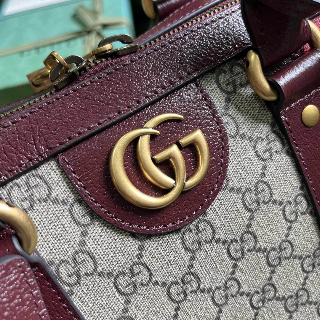 Gucci 724642 Mini GG canvas small duffle bag in Burgundy leather