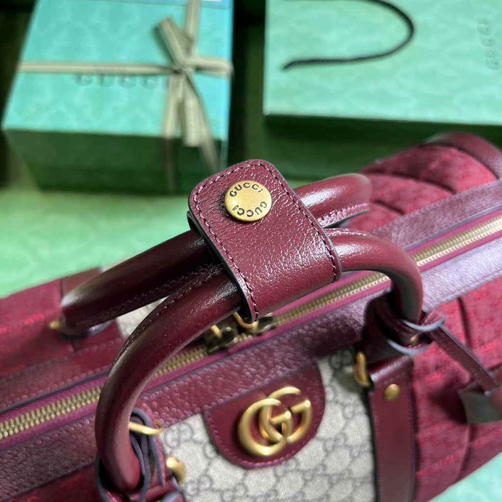 Gucci 724642 Mini GG canvas small duffle bag in Burgundy leather