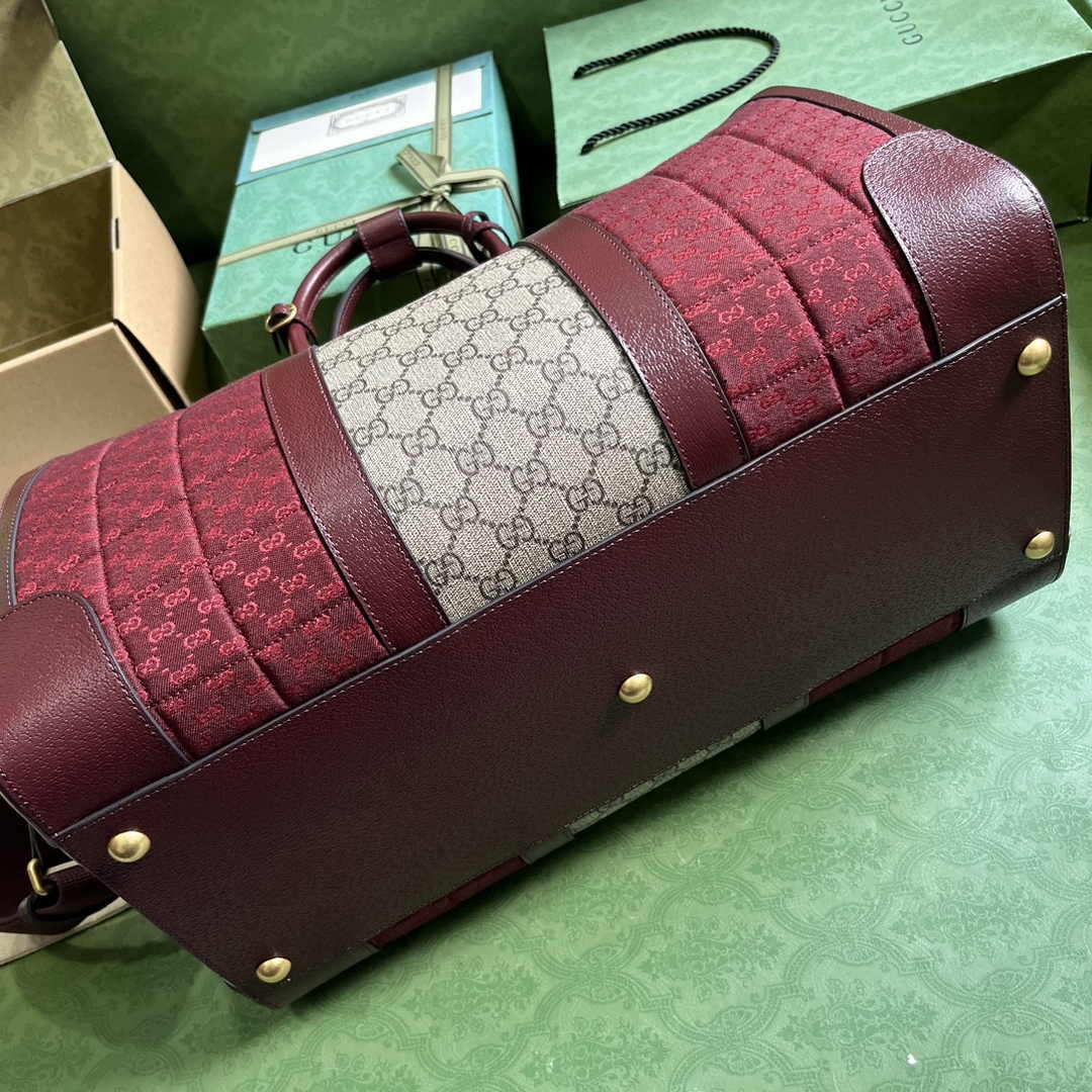Gucci 724642 Mini GG canvas small duffle bag in Burgundy leather