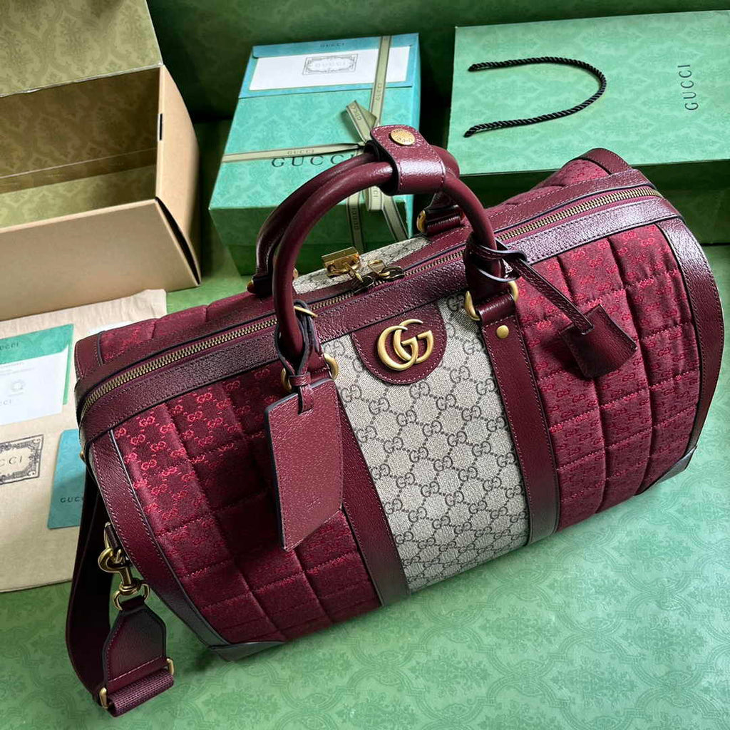 Gucci 724642 Mini GG canvas small duffle bag in Burgundy leather