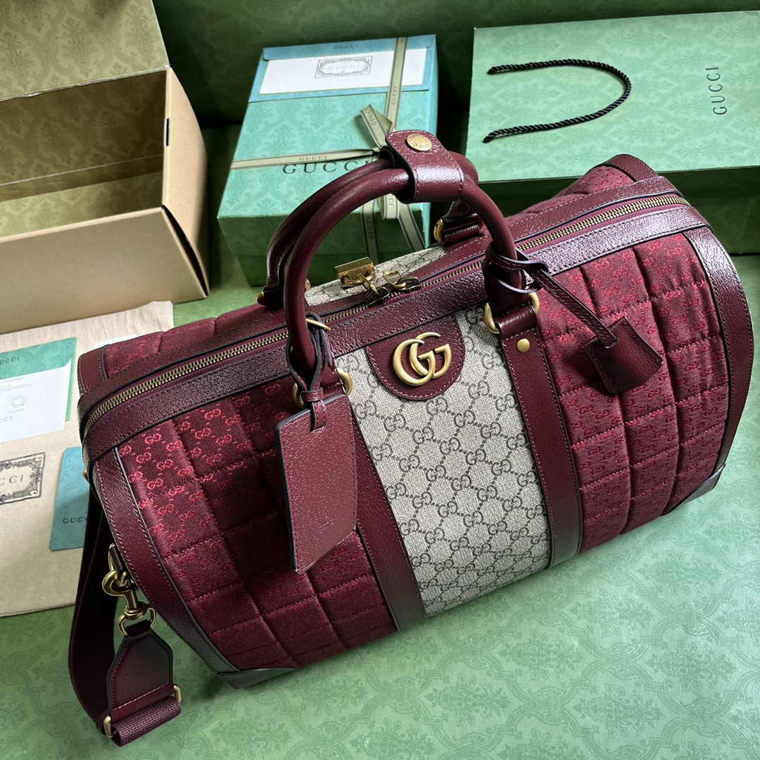 Gucci 724642 Mini GG canvas small duffle bag in Burgundy leather