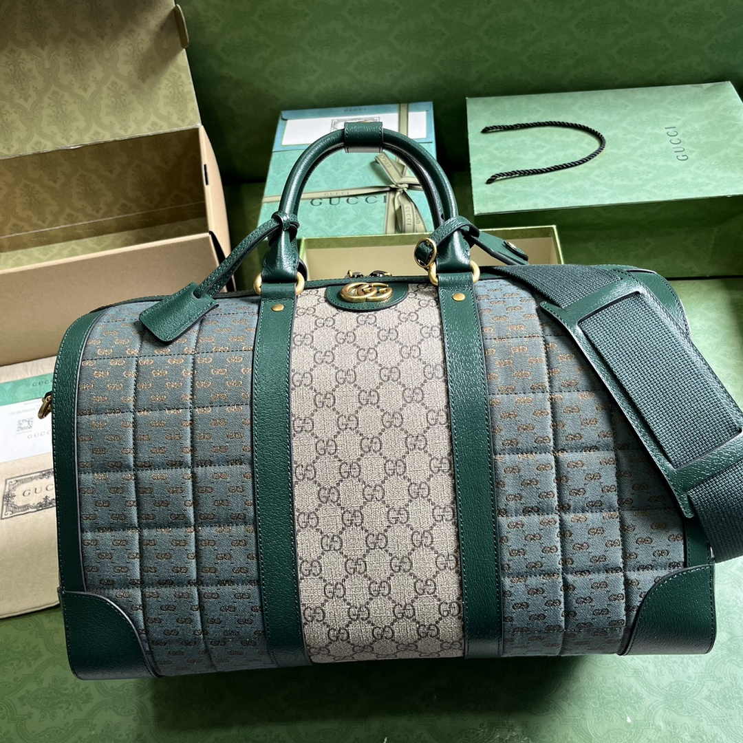 Gucci 724642 Mini GG canvas small duffle bag in Green leather