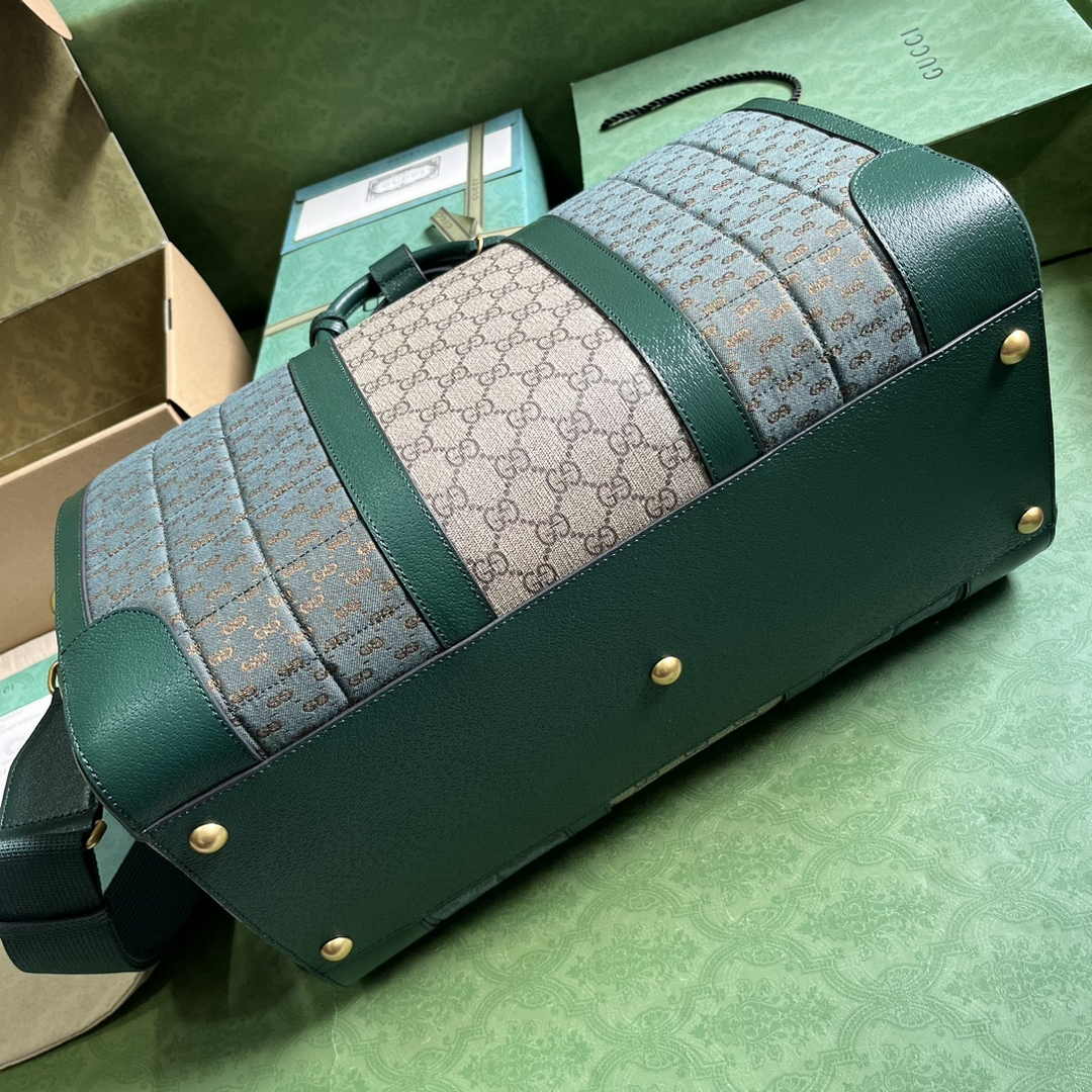 Gucci 724642 Mini GG canvas small duffle bag in Green leather