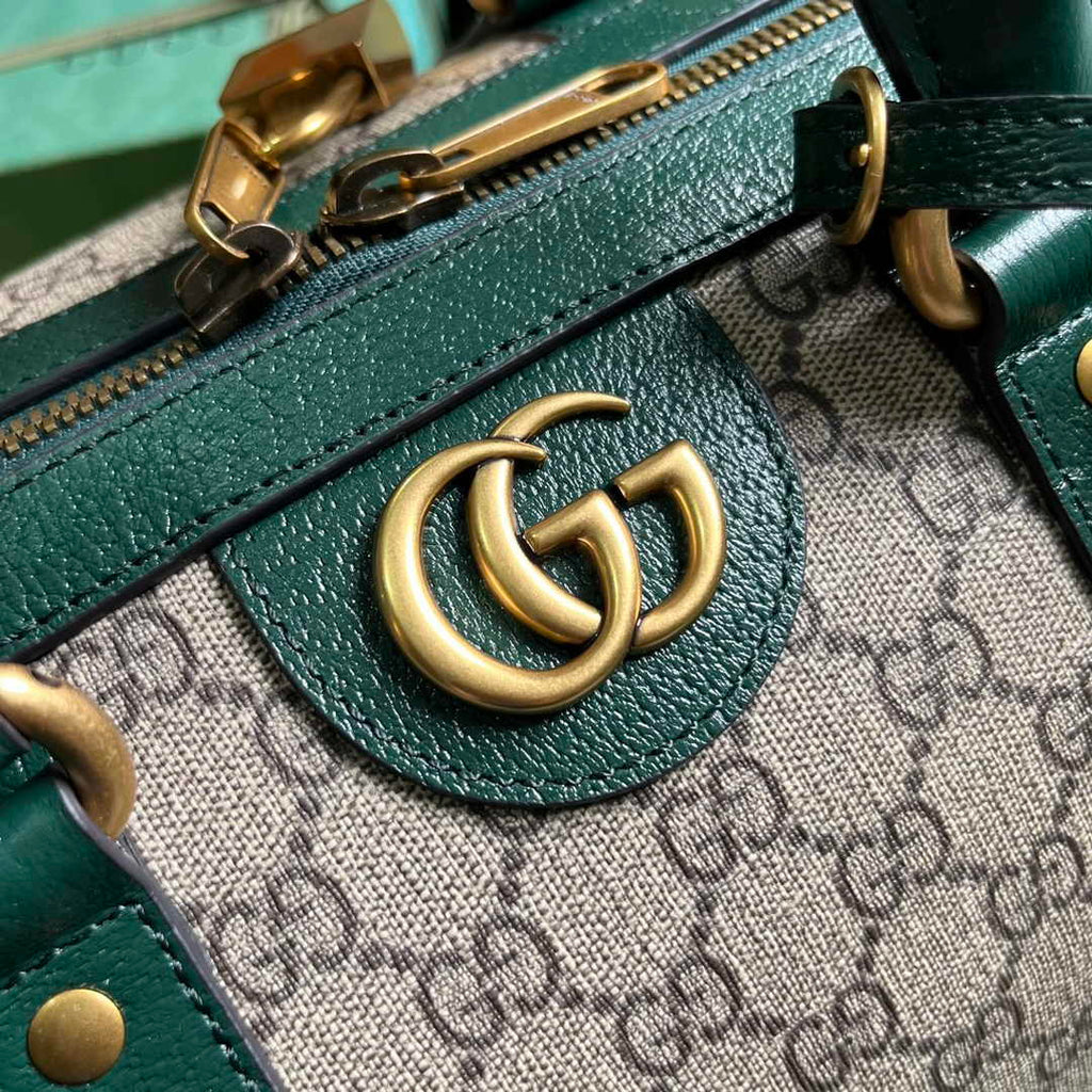 Gucci 724642 Mini GG canvas small duffle bag in Green leather