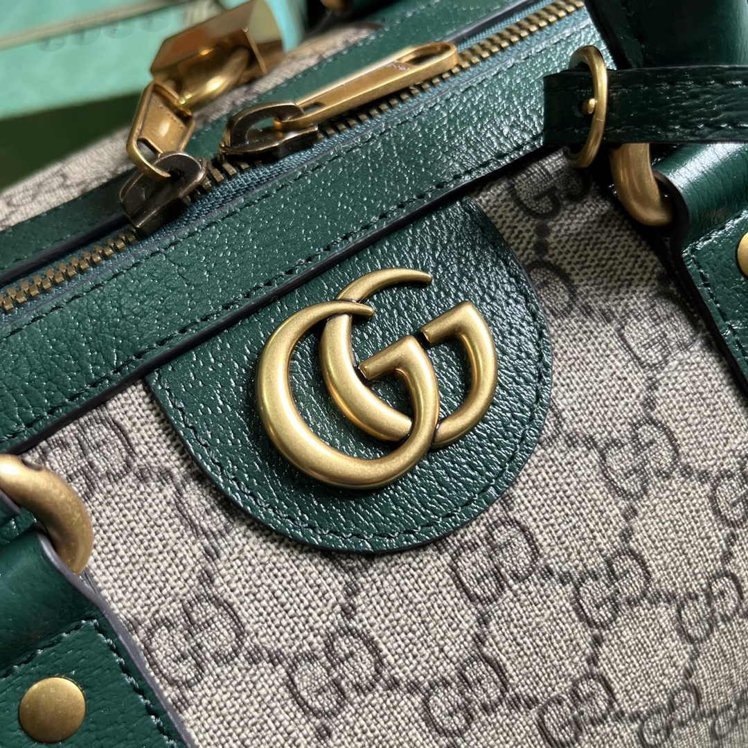 Gucci 724642 Mini GG canvas small duffle bag in Green leather